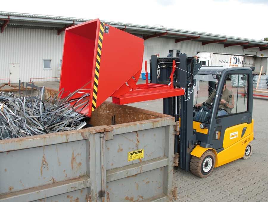A forklift truck with a tipping container attachment. The container is attached to the end of the forks and tilted to hold and transport materials. A forklift truck with a tipping container attachment. The container is attached to the end of the forks and tilted to hold and transport materials.
